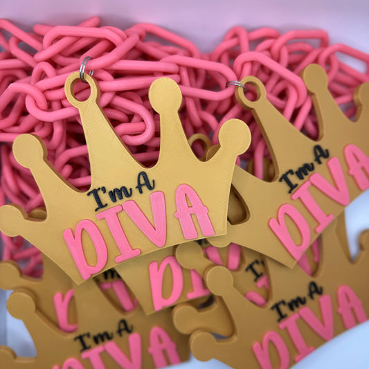 Gold crowns with 'I'm a DIVA' text on pink hype chains.