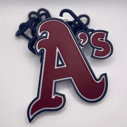 Keychain with 'A's' logo on a white background